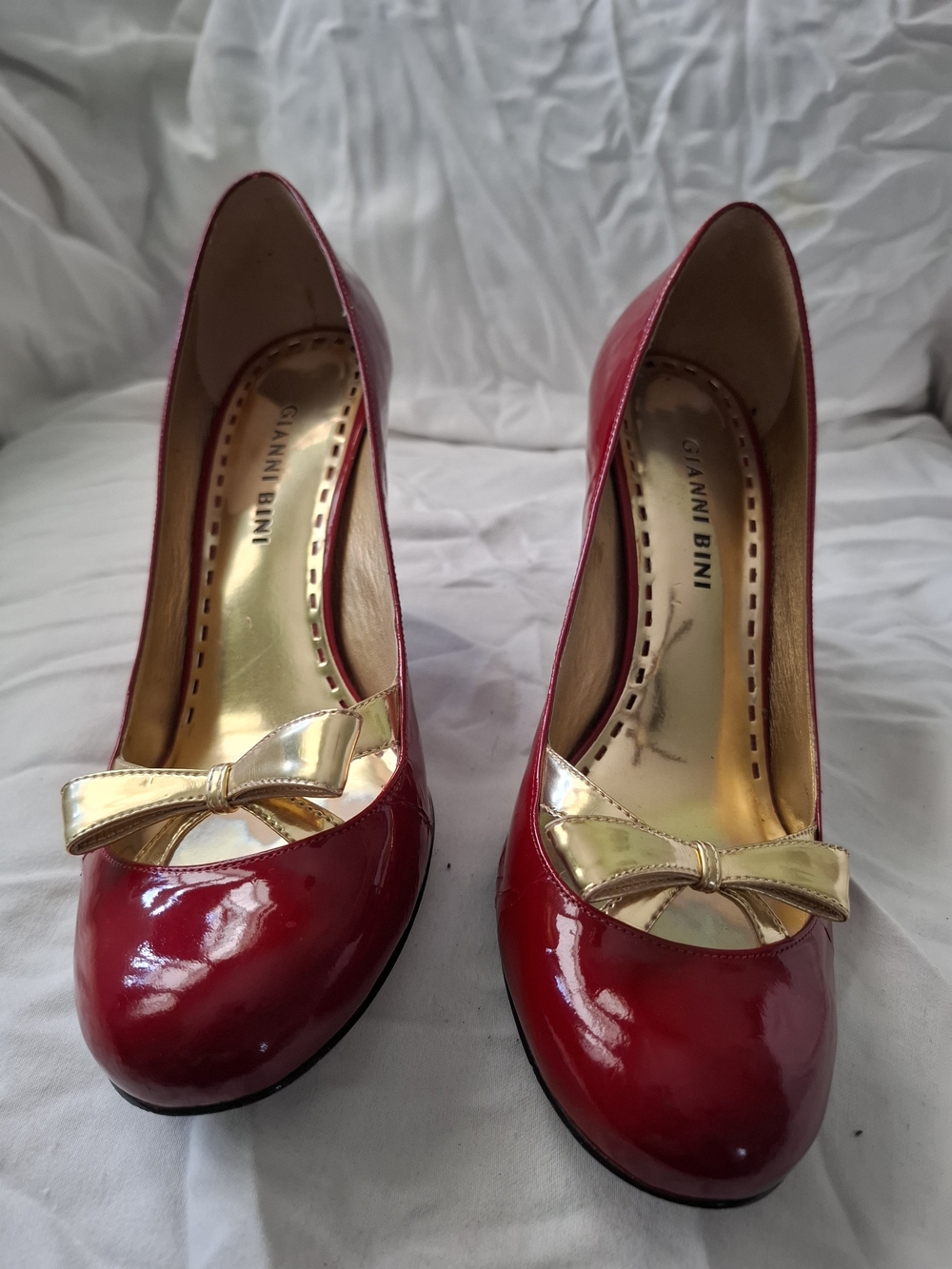Gianni Bini Red Patent Pumps with Gold Bow Accent